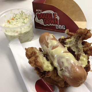 Illustration for article titled KFC's Double Down hot dog is a sausage wrapped in a fried chicken bun